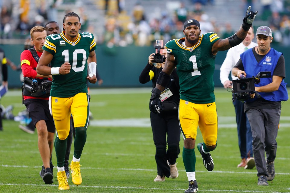 GREEN BAY, WI - SEPTEMBER 07: Green Bay Packers quarterback Jordan Love (10) and Green Bay Packers defensive end Micah Parsons (1) run off the field after a game between the Green Bay Packers and the Detroit Lions on September 7, 2025 at Lambeau Field in Green Bay, WI. (Photo by Larry Radloff/Icon Sportswire via Getty Images)